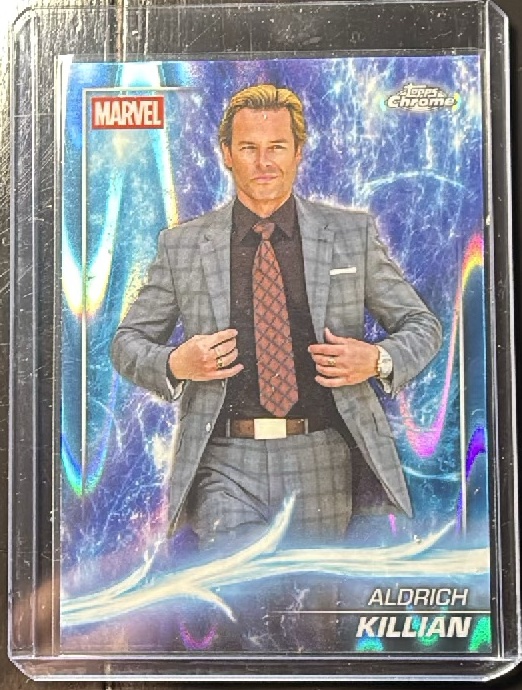 Aldrich Killian Sky Blue RayWave Refractor trading card from 2025 Topps 2025 Topps Marvel Studios Chrome