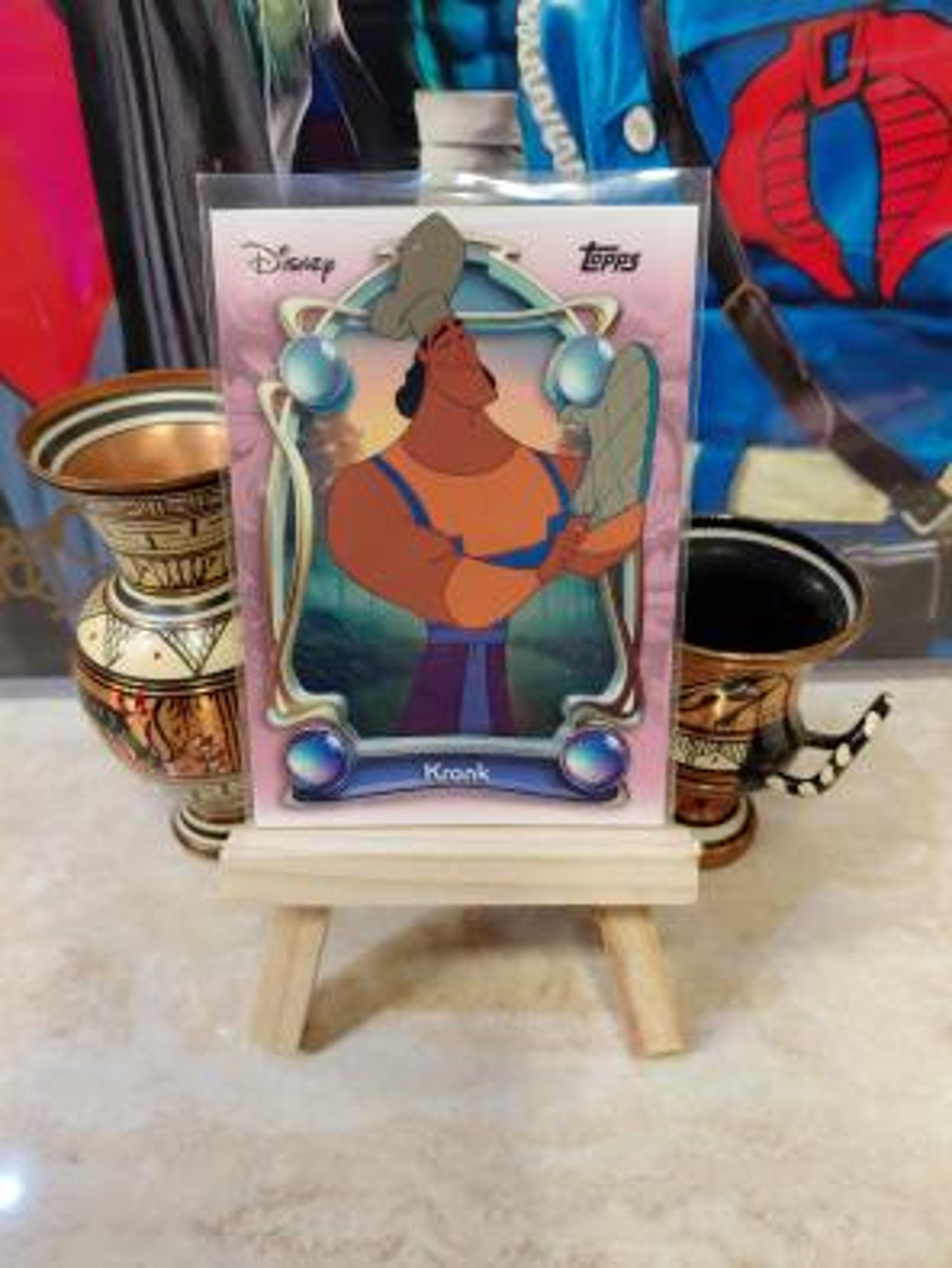 Kronk Red Refractor /5 trading card from 2025 Topps 2025 Topps Disney Wonder